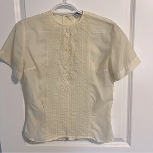 Vintage lace-trimmed blouse. The brand is Morlove. Sheer, cream colored, light.